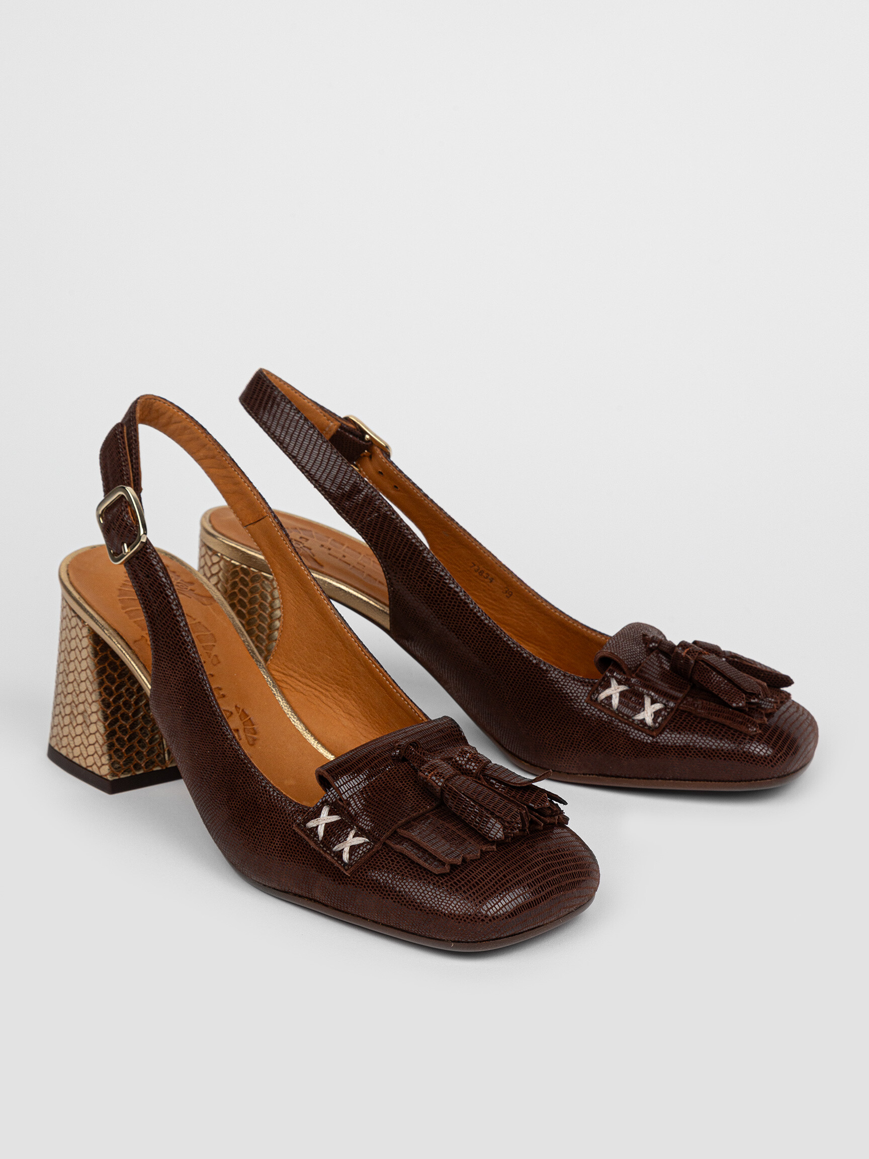 Sueki leather slingbacks with relief