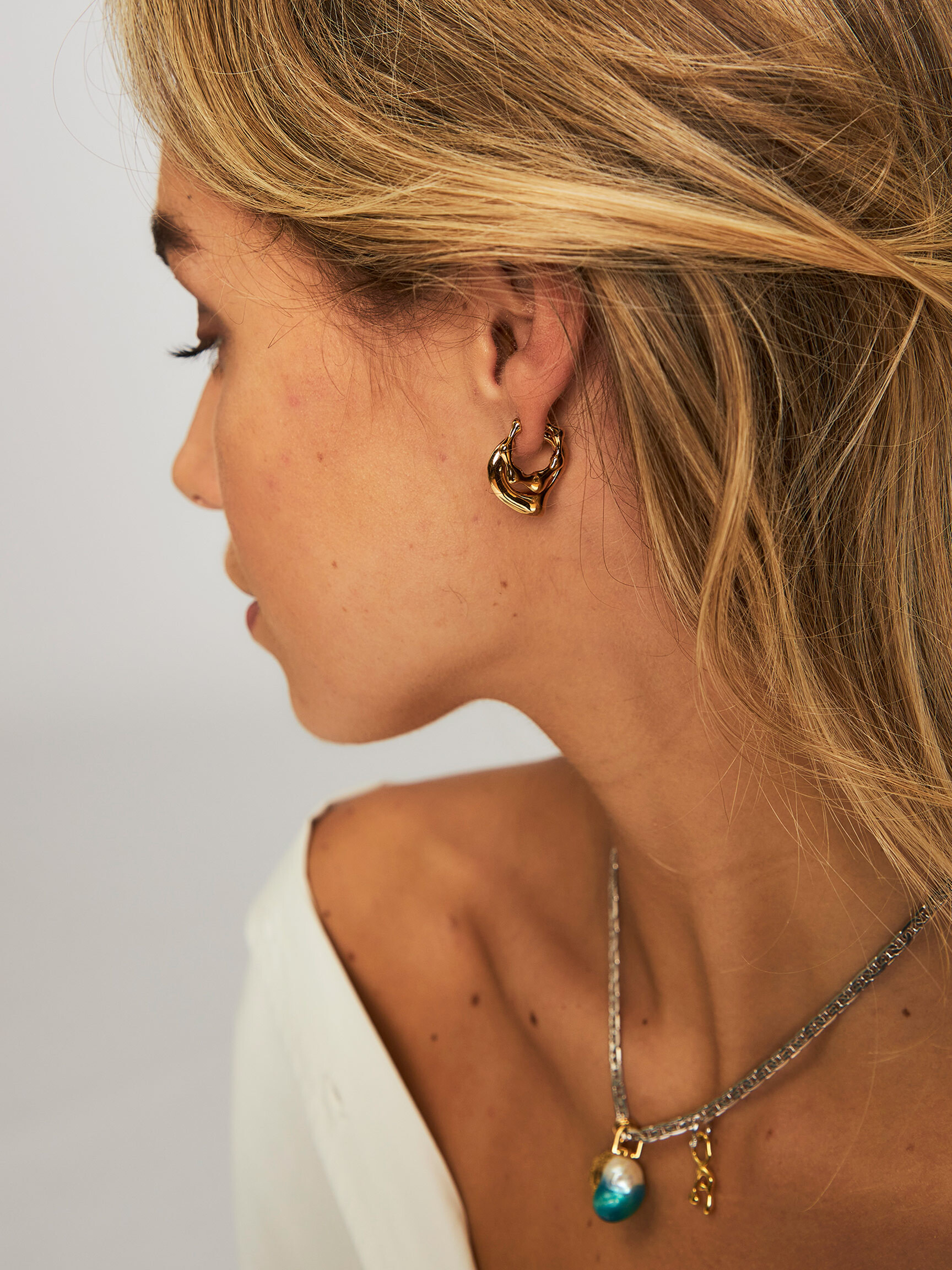 Earrings on online black one piece